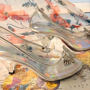 Size 6 ladies Cinderella pump with a silver butterfly adorning the top ...